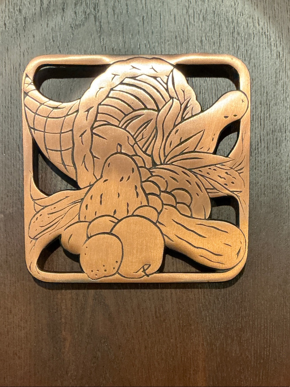Carved Wood Cornucopia Cast Iron with Copper accents Trivet